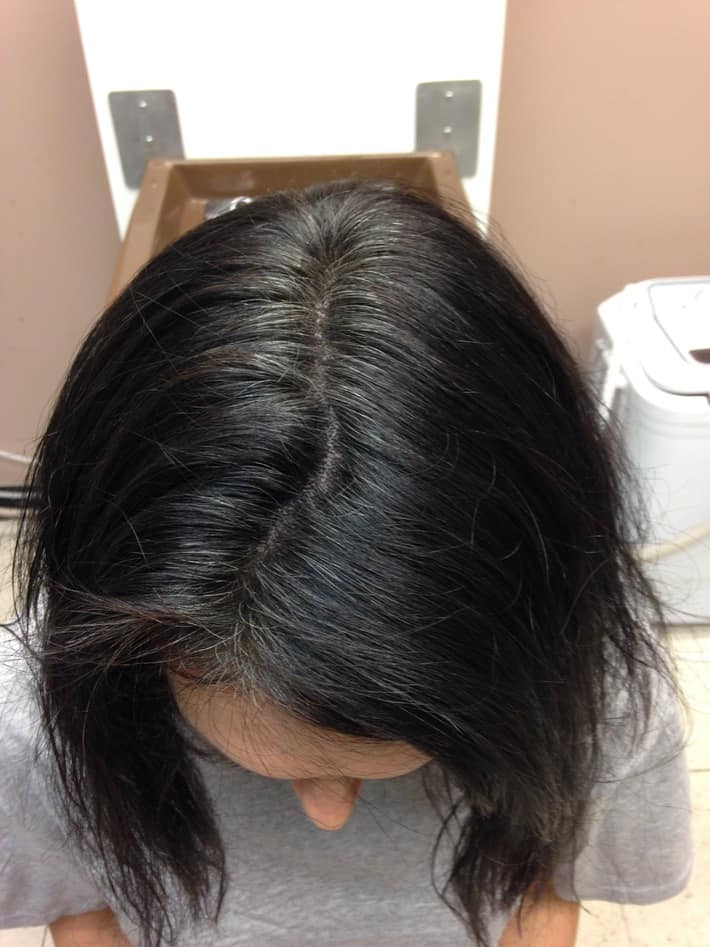 an image of my hair after using hairprint. there are still some gray hairs showing.