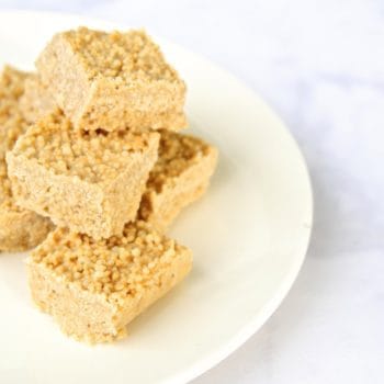puffed quinoa tahini bars stacked on a plate as a healthier substitute for rice crispy treats