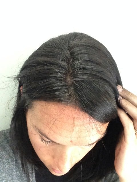 showing what one box of hairprint looks like after applying. some gray hair shows through.