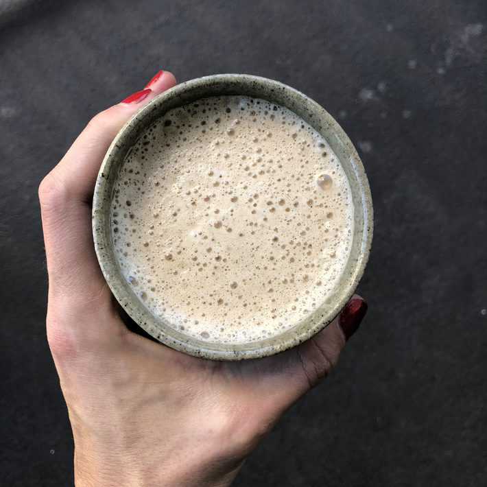 dairy free blended coffee in a hand made coffee mug