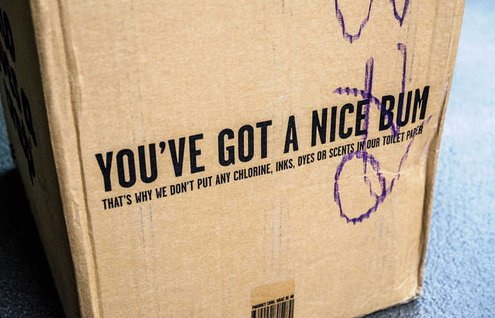 the outside of the shipping box displays the message "you've got a nice bum" 