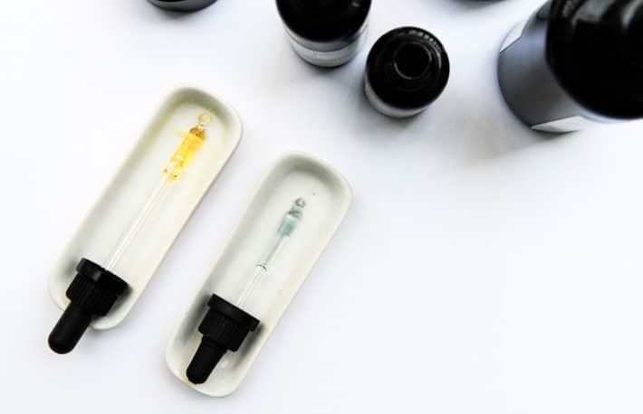 the KHUS + KHUS face serums shown in their droppers are a brilliant yellow and a cool blue 