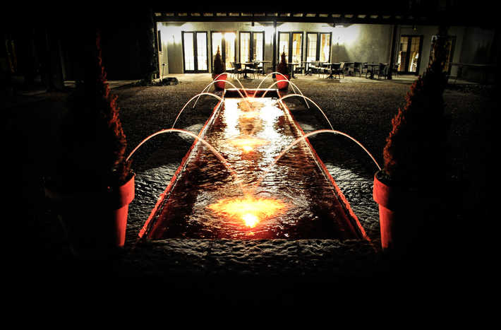 HOTEL DOMESTIQUE courtyard at night
