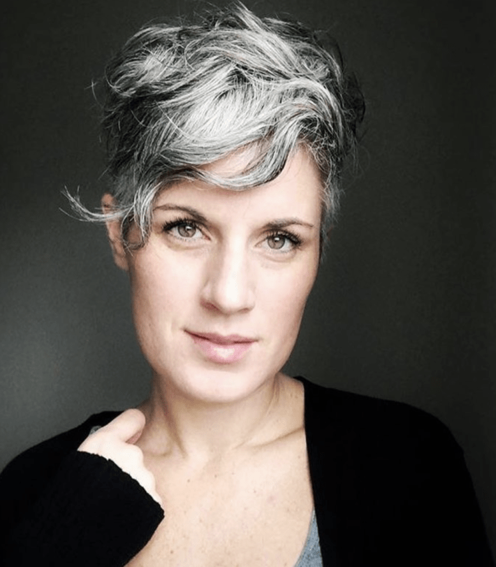 A woman with gray hair.