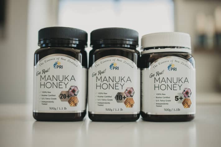 three bottles of PRI Manuka honey