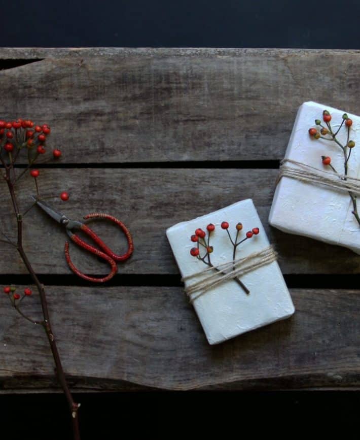 recycled handmade biodegradable white paper with twine and berries