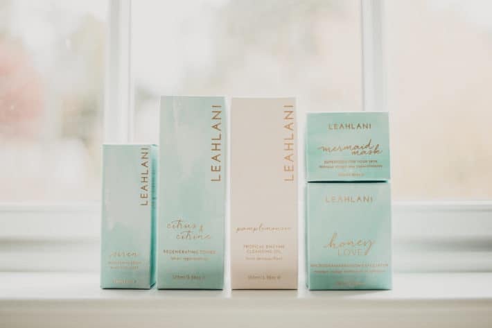 leahlani products lined up on a sill