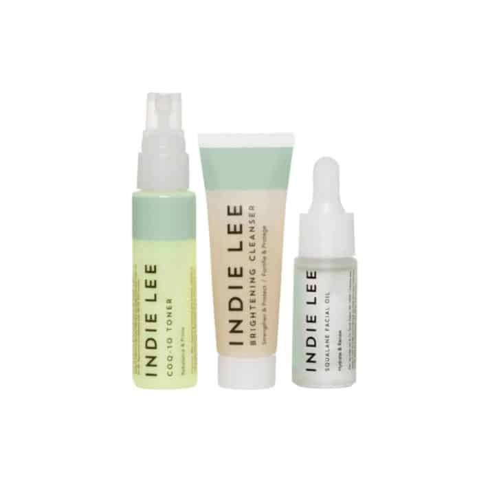 three bottles of Indie Lee beauty products