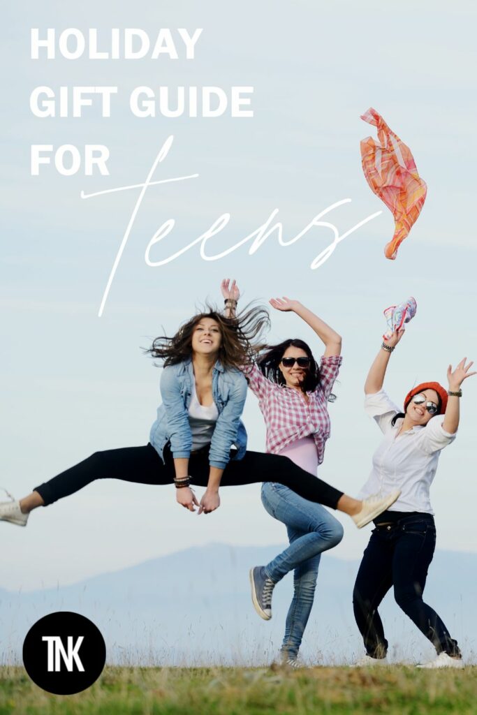 A group of teens jumps up.