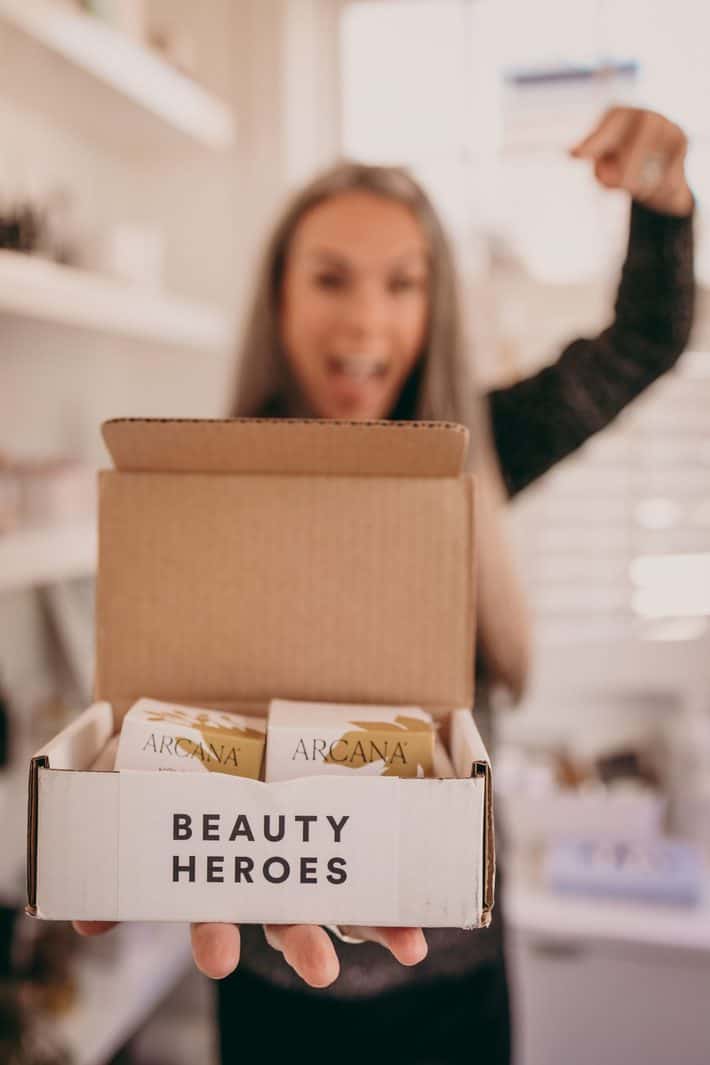 woman holding beauty box from Beauty Heroes