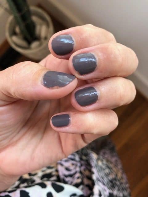 A swatch of Sally Hansen Good.Kind.Pure. nail polish in soothing slate after 3 days of wear.