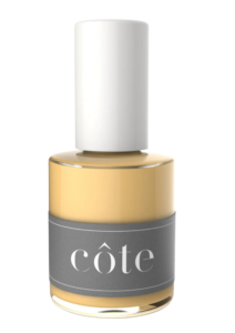 A bottle of Cote No 58 Yellow Daisy nail polish.