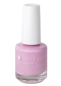 A bottle of Dazzle Dry Soft Caress nail polish.