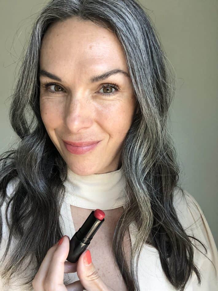 A woman wearing Henne lipstick