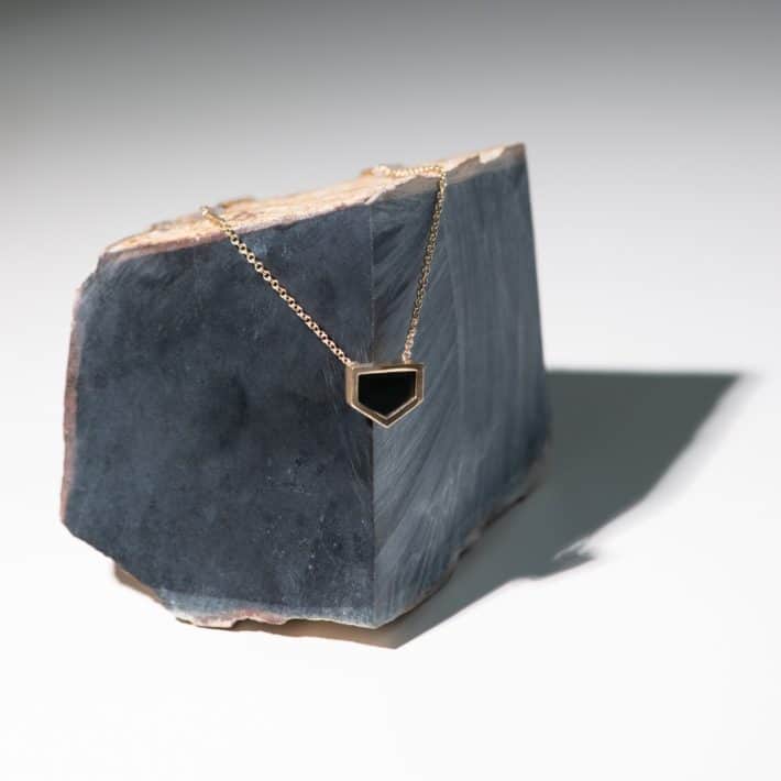 Necklace with dark stone