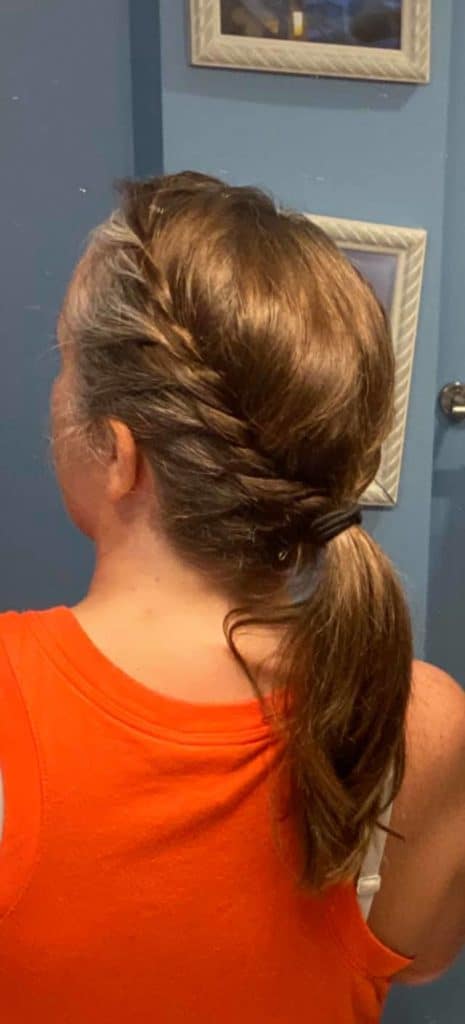 woman with braided pony tail