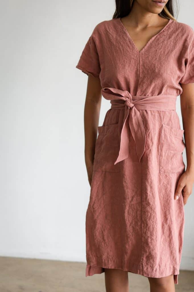 a blush linen dress with a tie waist 