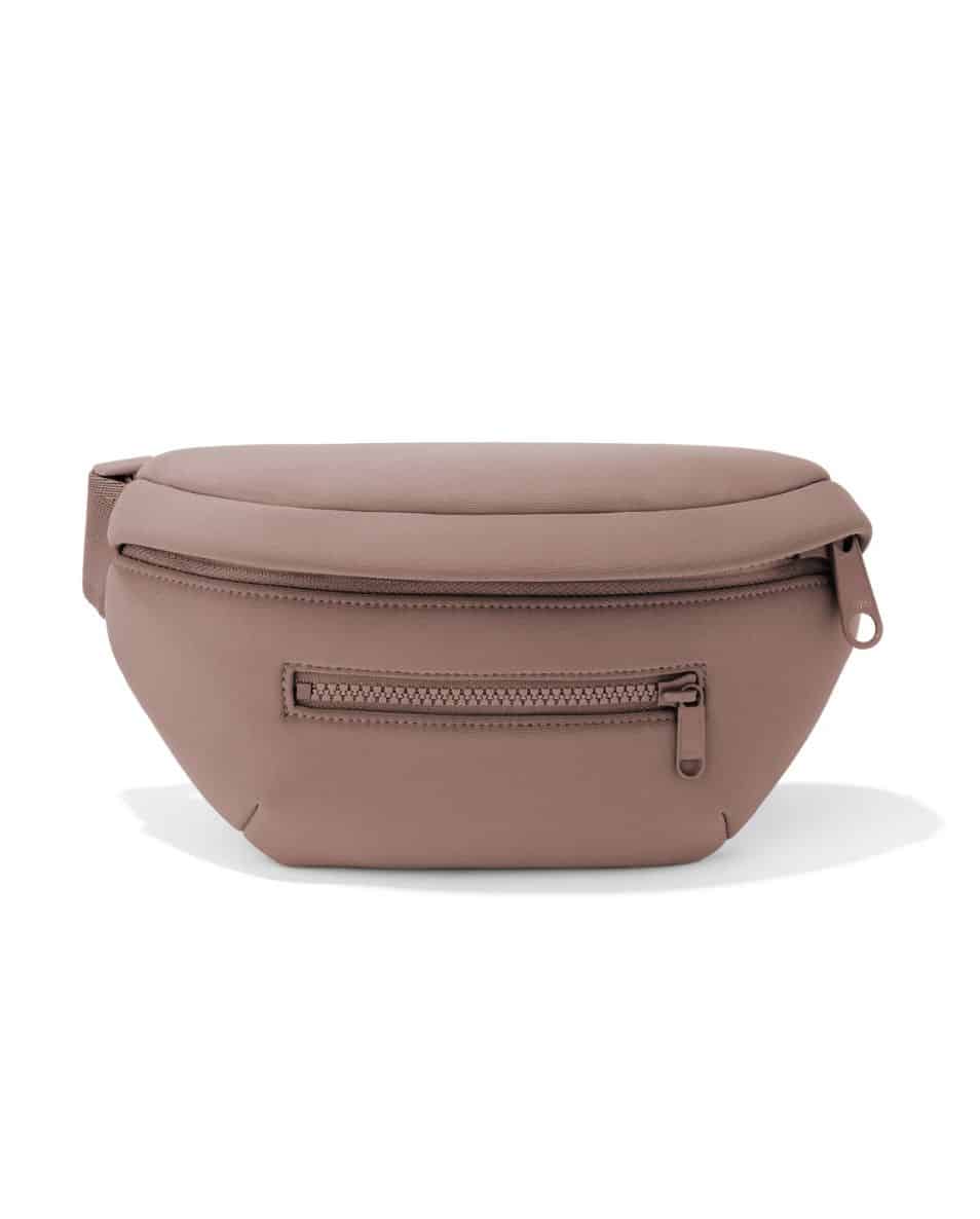 a mauve fanny pack with two zippers