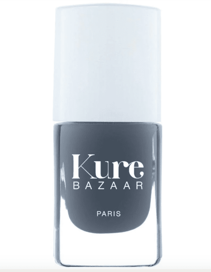 a bottle of kure bazaar nail polish in Bazaar Smokey (a dark gray)