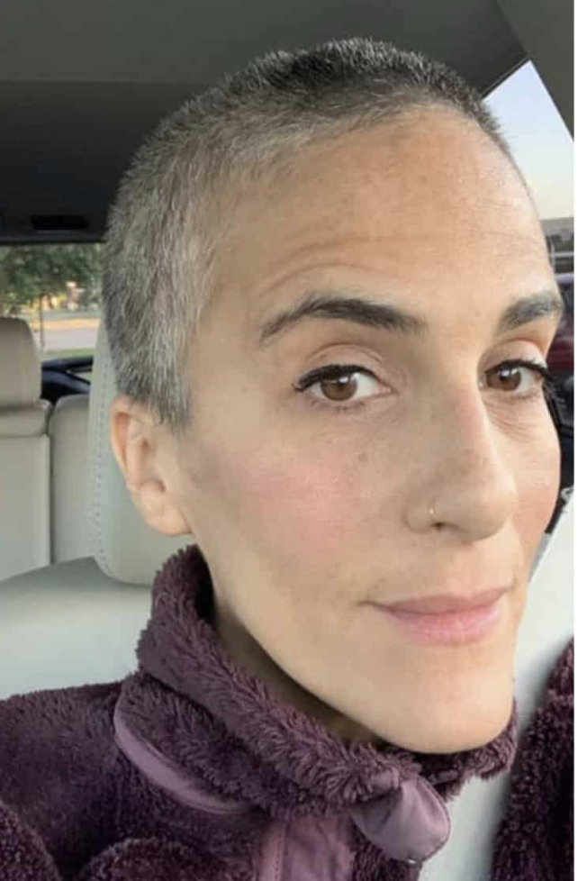 a woman going gray chose to shave her head.