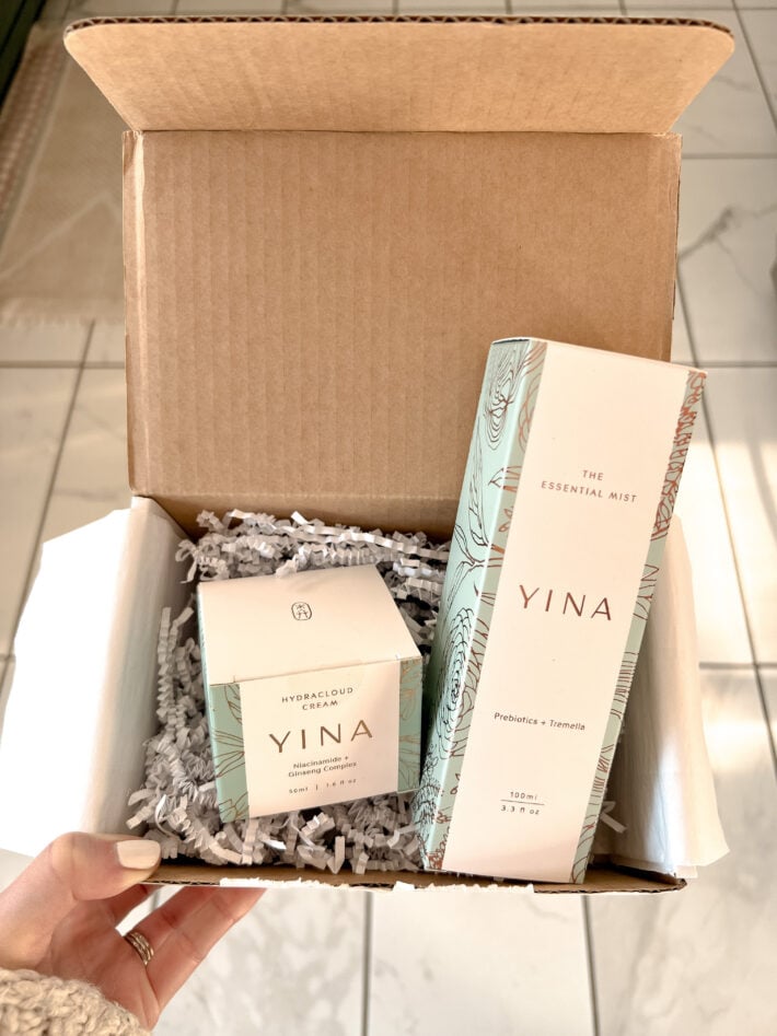 A box with two products by YINA inside of it.