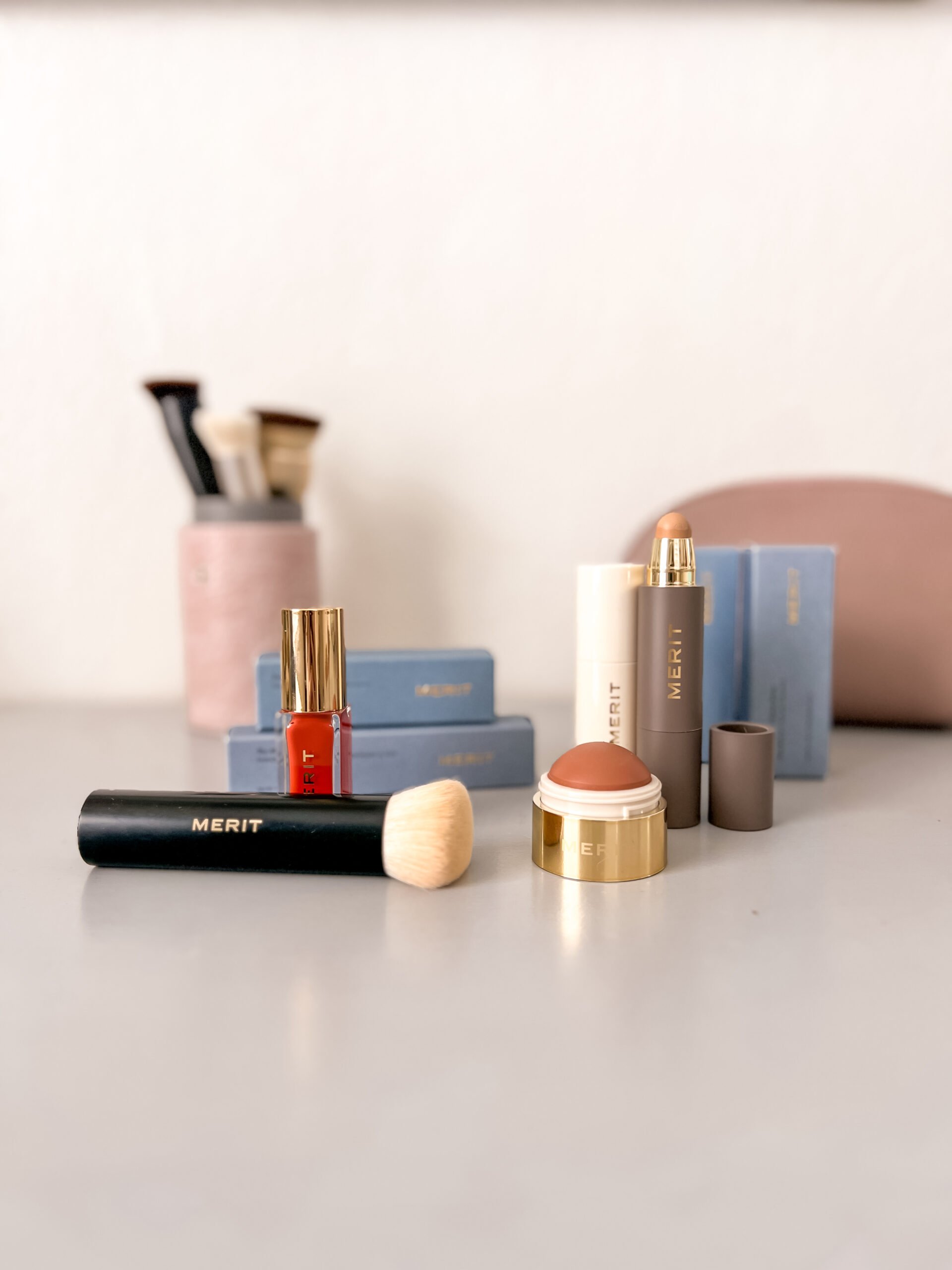 A collection of MERIT Beauty products.