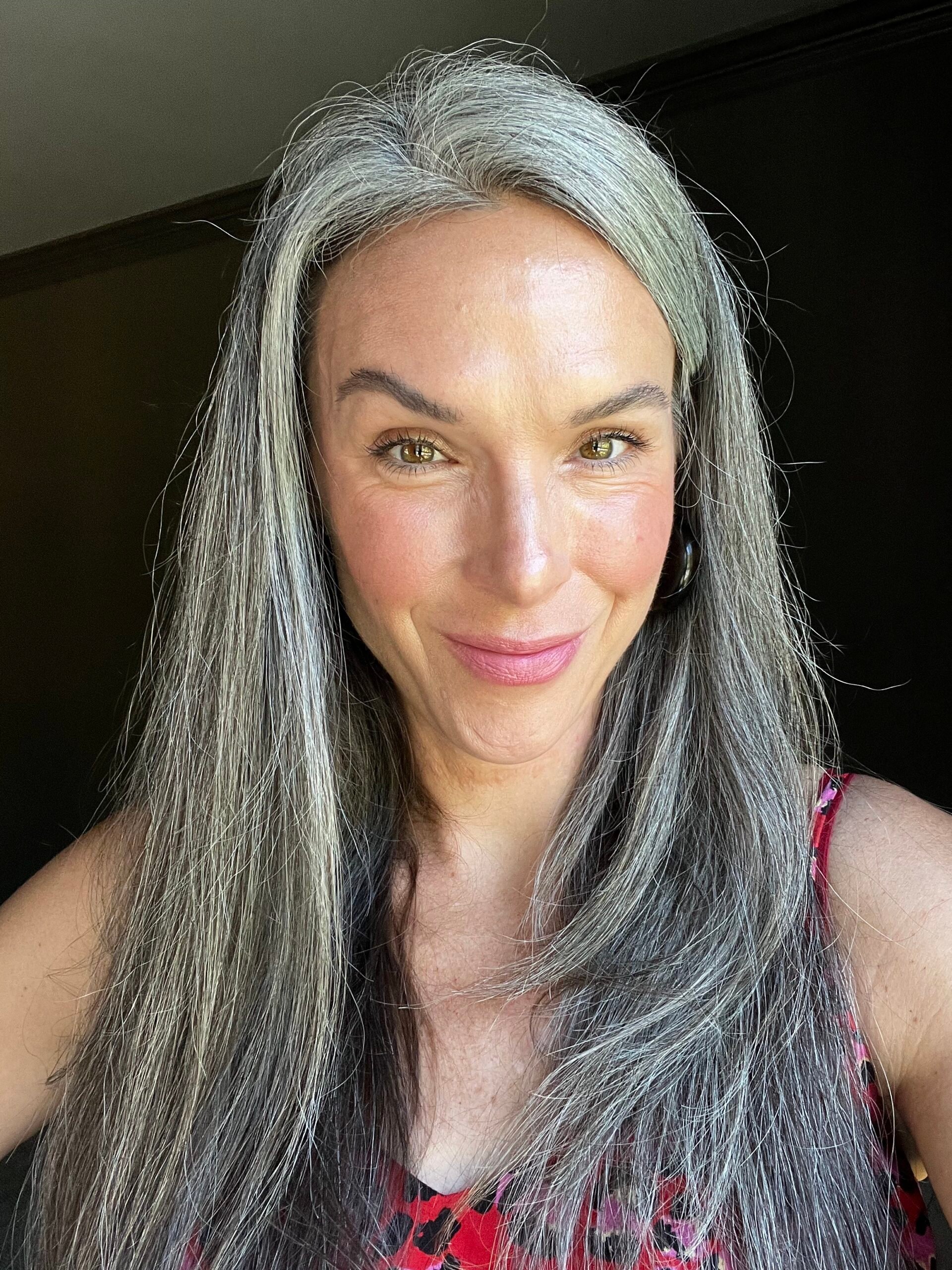 a woman with long gray hair
