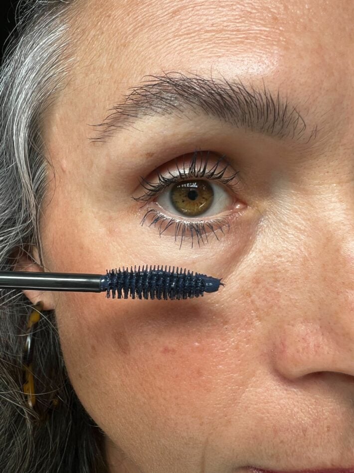 Fitglow mascara applied to a woman's lashes.