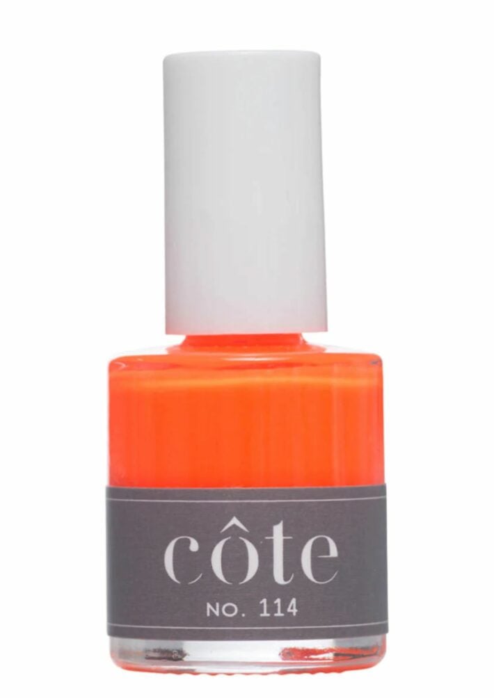 A bottle of Cote No.114 Neon Orange nail polish.
