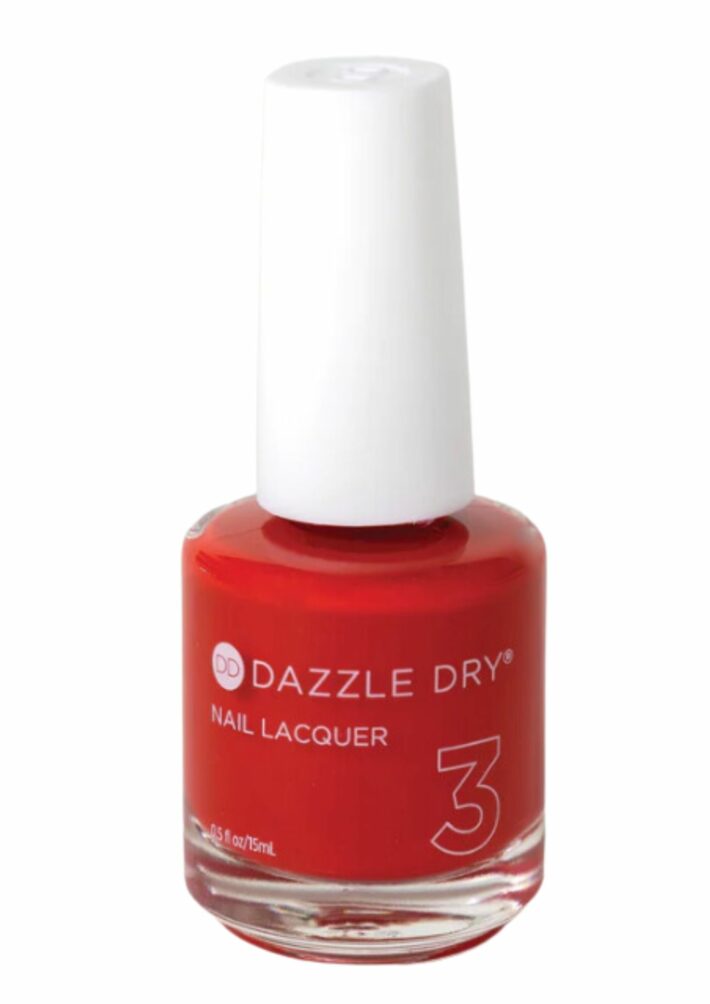 A bottle of Dazzle Dry Pep Rally nail polish.