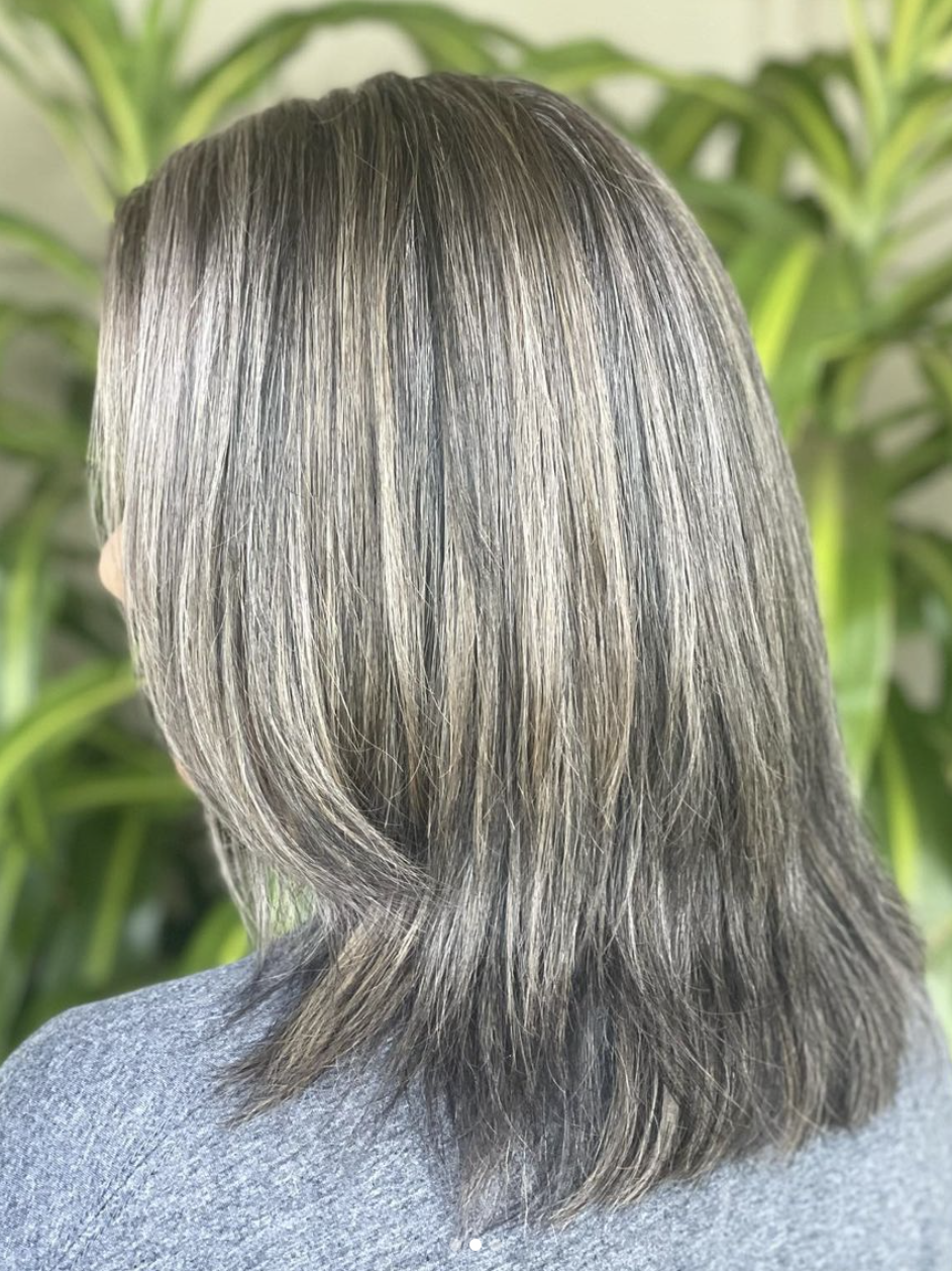 The backside of a woman's hair after gray blending.
