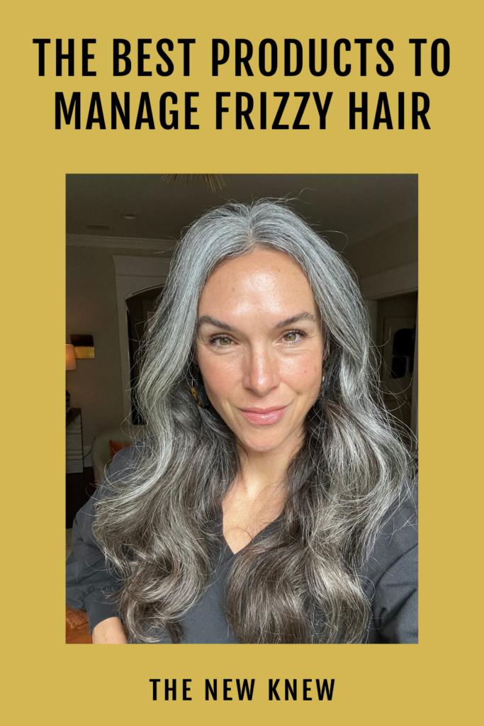 A woman with long wavy gray hair.
