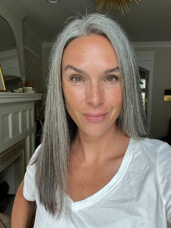A woman with gray hair after using the SpeedStyle.