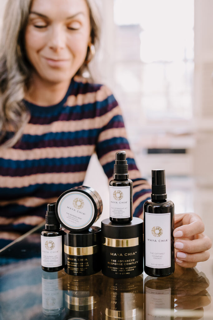 A woman with a lineup of products