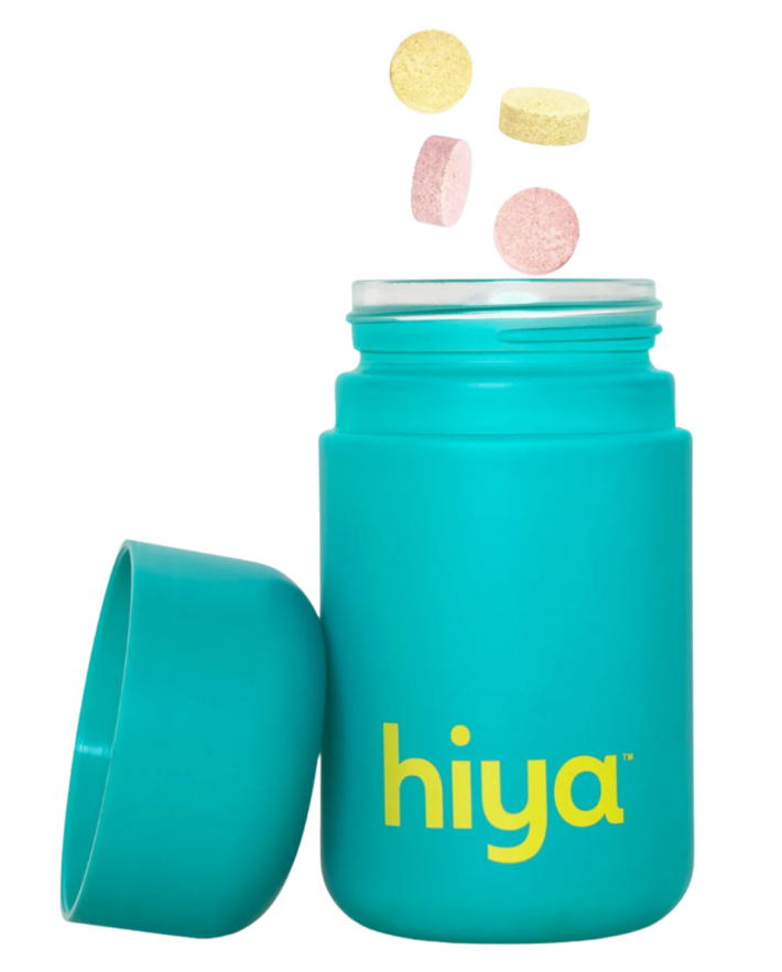 A bottle of Hiya Kids Daily Probiotic with 4 tablets above the bottle. 