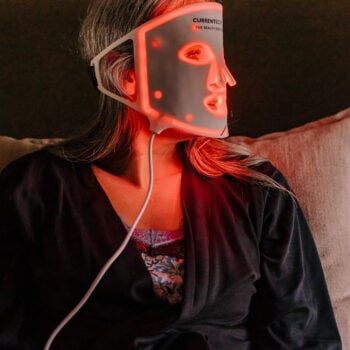Lisa wearing the CurrentBody LED face mask.