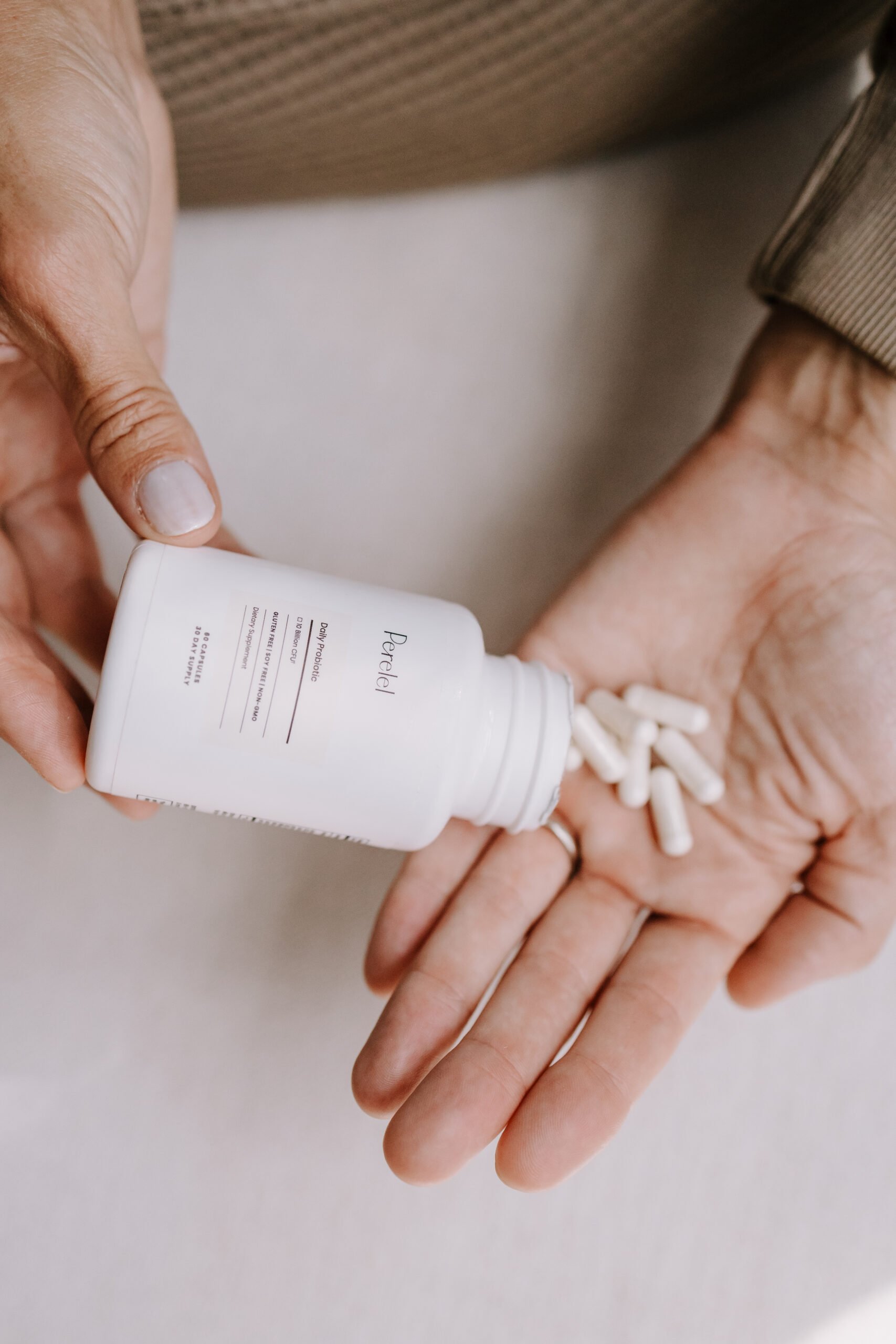 Perelel Daily Probiotic in someone's hands. 