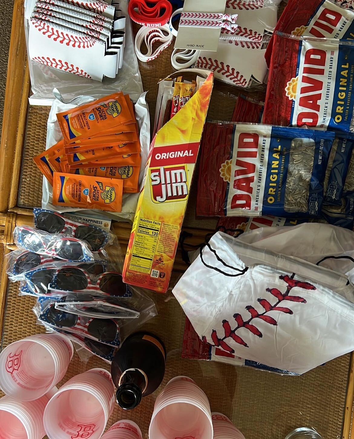 An assortment of items for baseball swag bags.